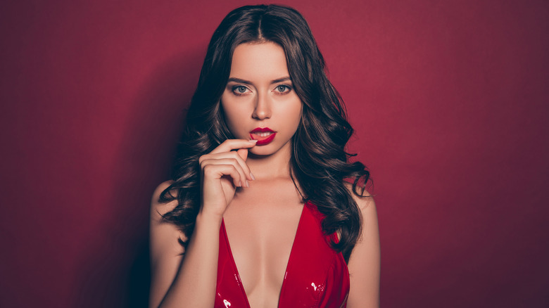 seductive woman in red dress
