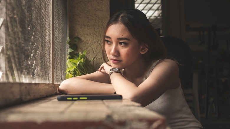 Woman waiting for a phone call