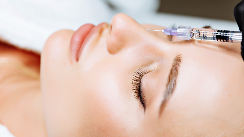 woman getting nose injections