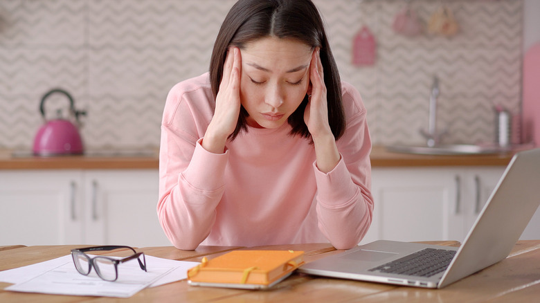 woman working drowsy