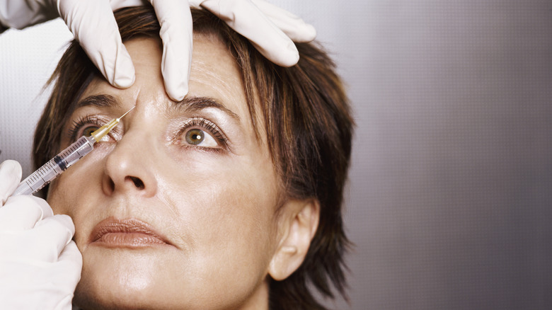 Woman receiving botox injections