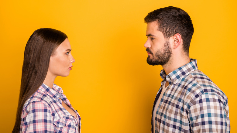 couple in plaid shirts