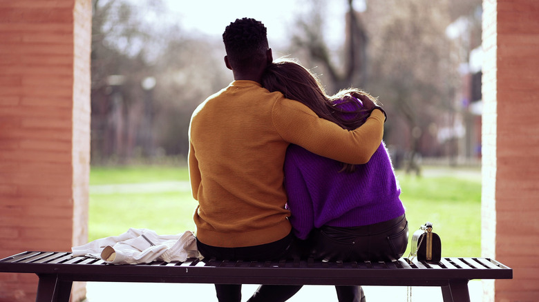 Man and woman on bench