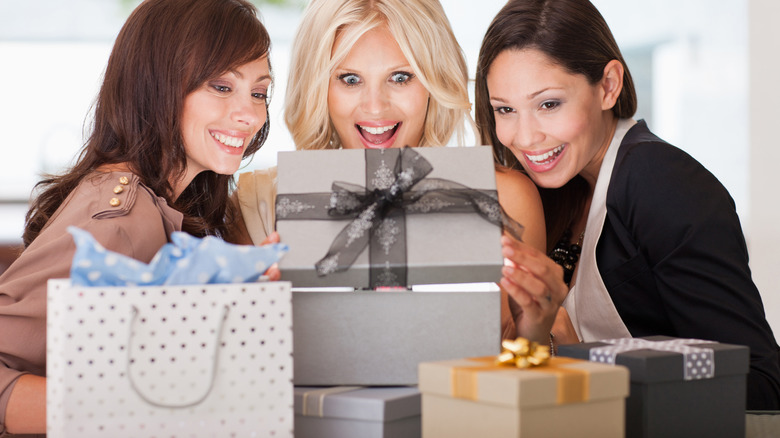 Women opening gifts