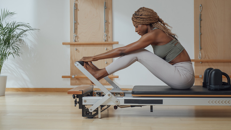 Girl on Pilates reformer