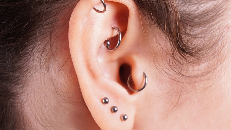 close up of earrings in ear