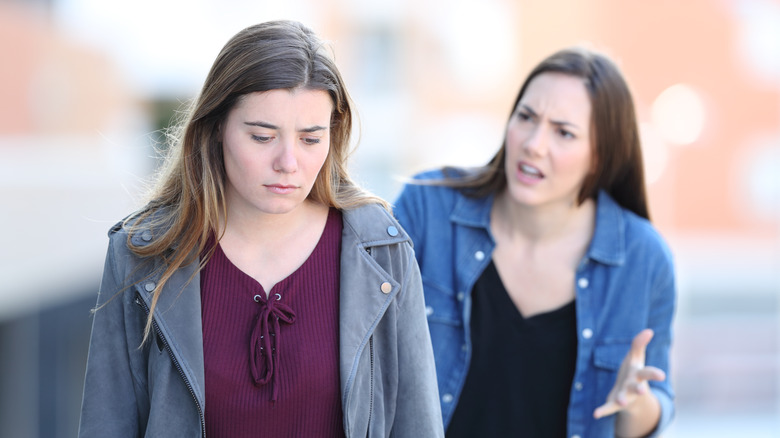 Woman yelling at another woman