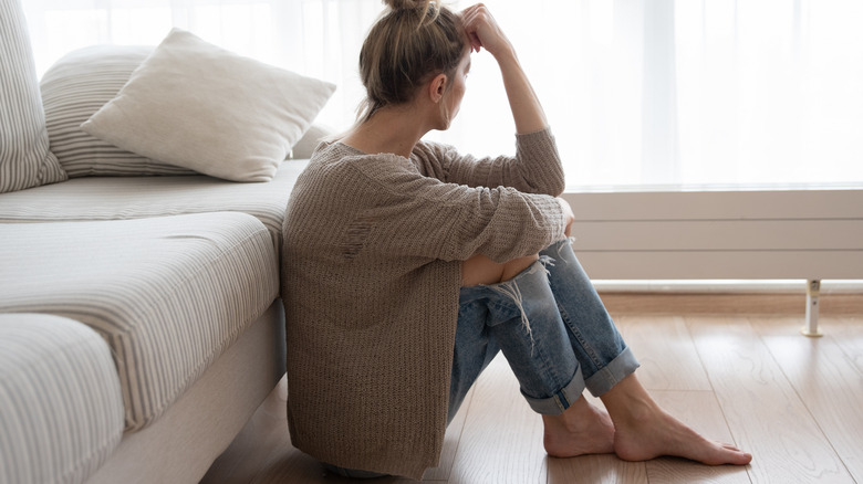 woman sitting alone