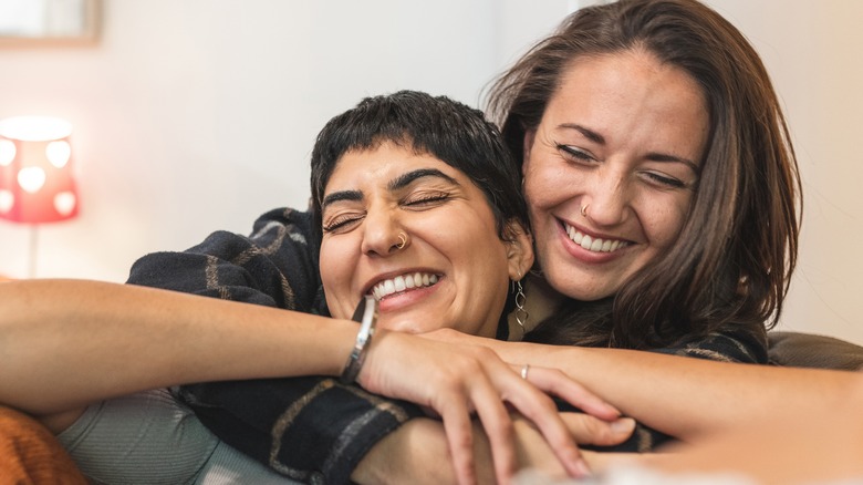 two women cuddling