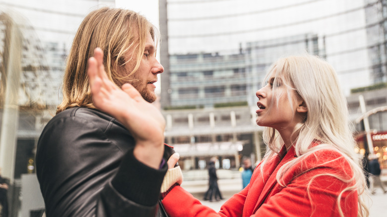 couple arguing in public