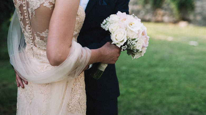 Couple in vintage bridal attire