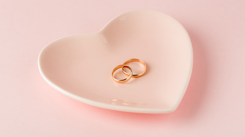 Two rings in heart-shaped dish