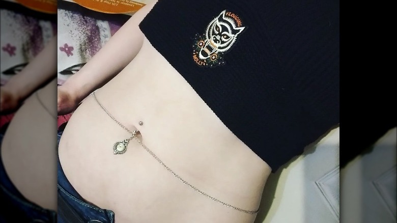 White gold waist chain paired with belly button ring