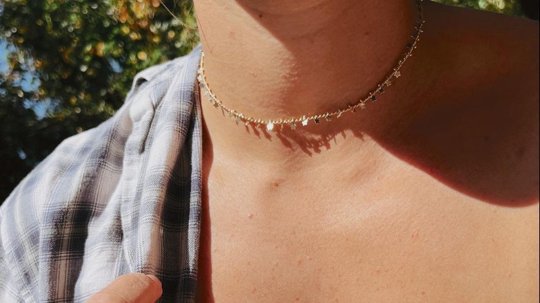 White gold choker with flower charms