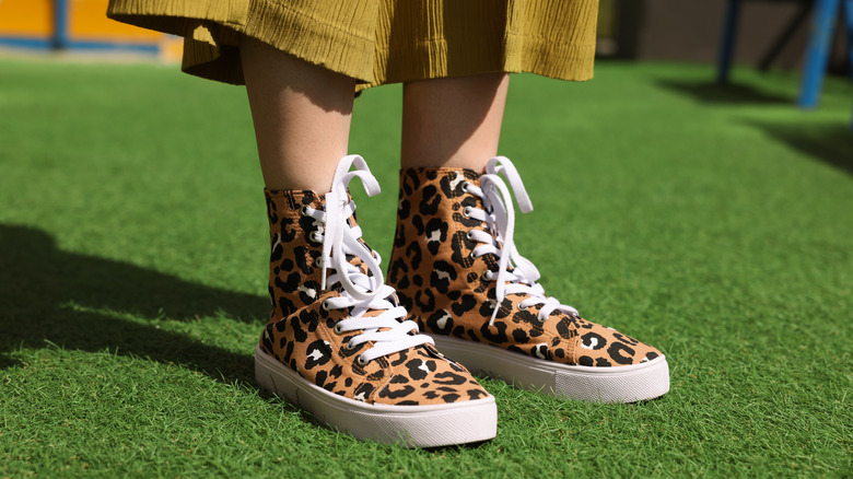 Leopard print high top sneakers