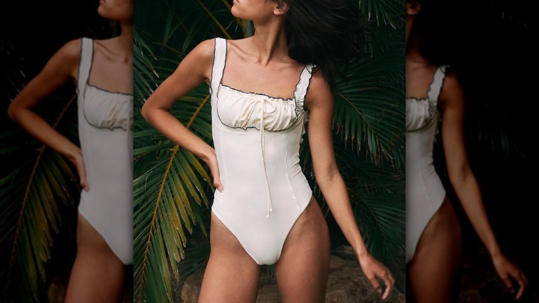 Woman in white one piece