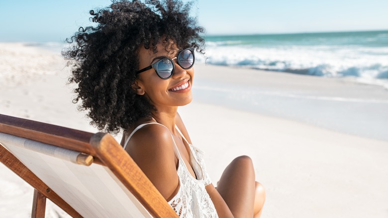 Woman happy on beach