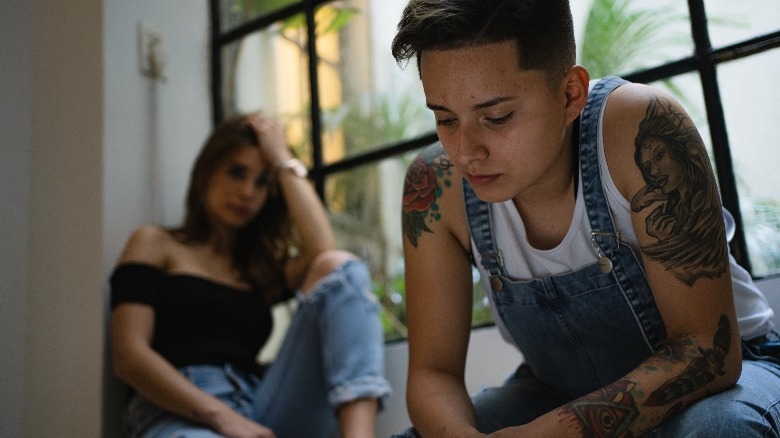 Young couple in sad silence