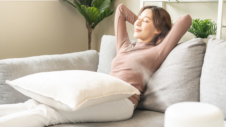 Woman relaxing with mister