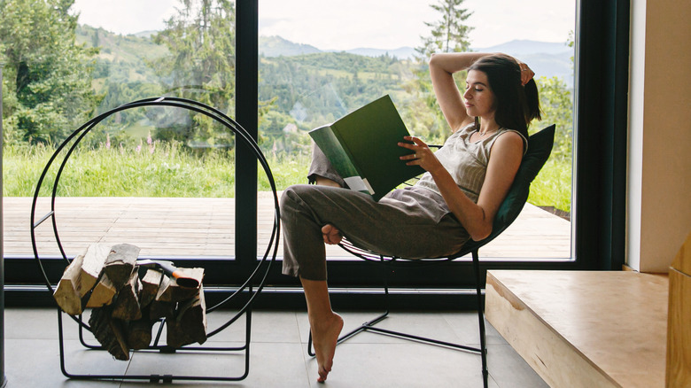 Woman in minimalist living space