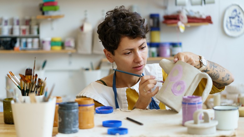 young woman making art