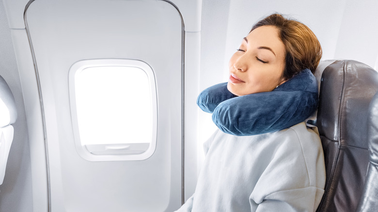woman relaxed on flight
