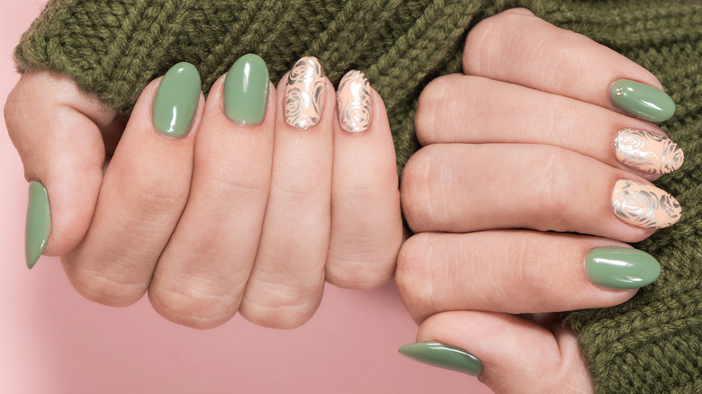 Person with green rounded nails