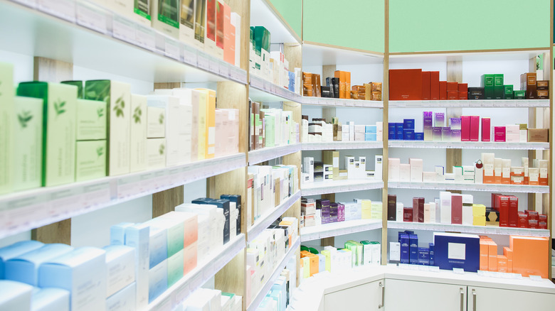 rows of shelves containing skincare products