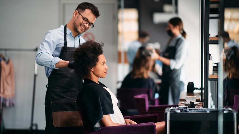 curly hair woman at salon