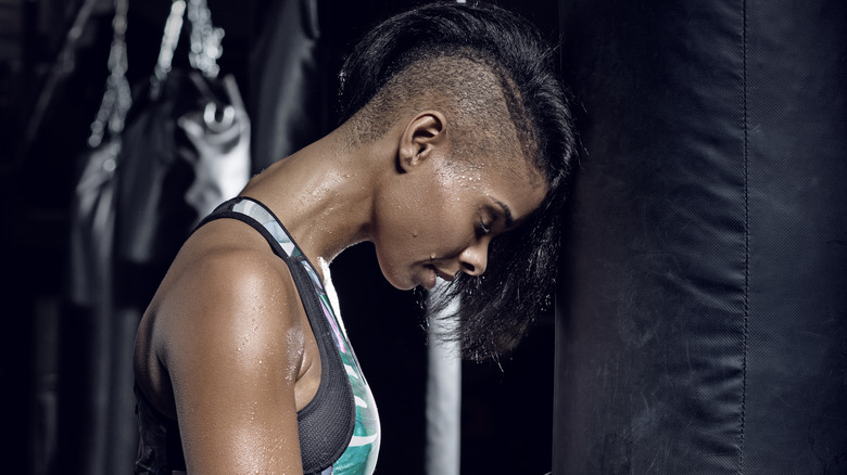 Woman sweating at the gym