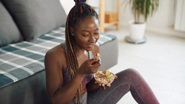 woman eating healthy snack