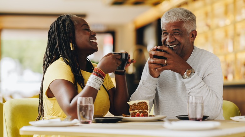 couple smiling at coffee