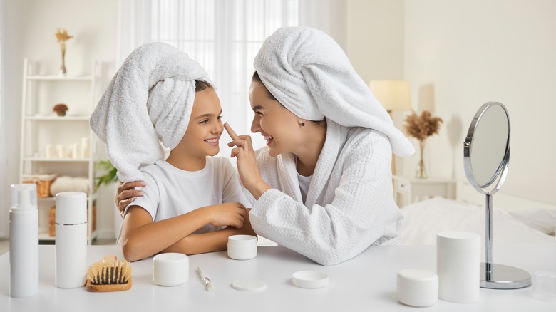 woman and daughter spa day