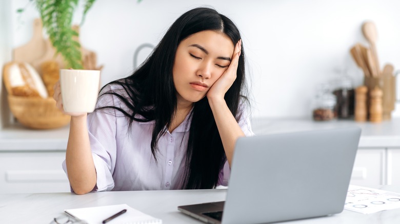 sleepy woman at work