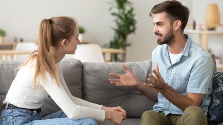 Man and woman having discussion