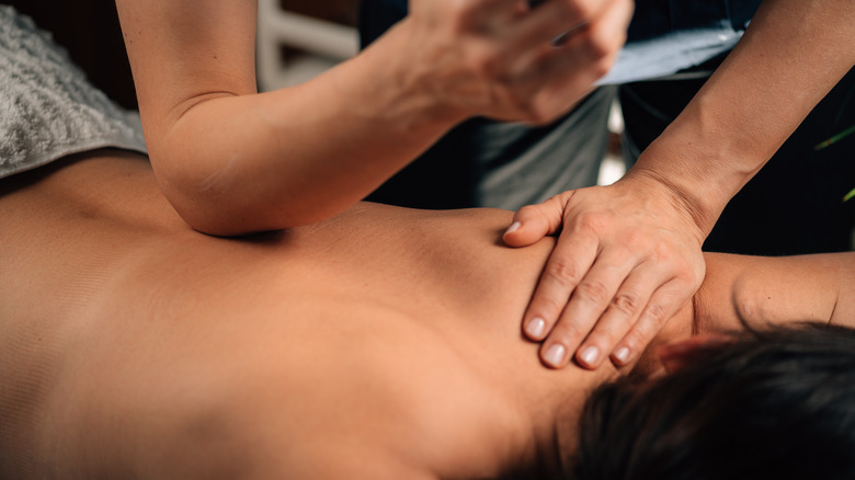 Person getting deep tissue massage