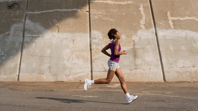 Woman runs in city