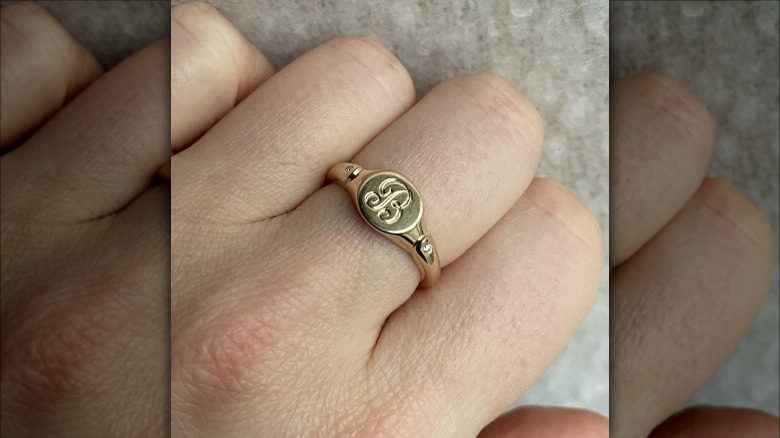 signet ring with a letter