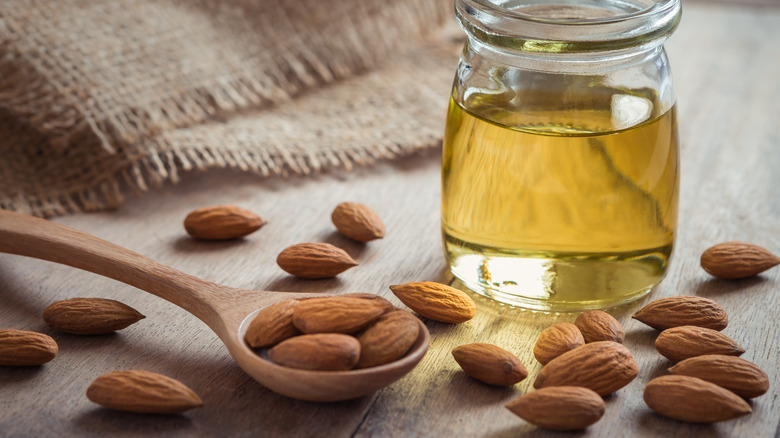 almond oil next to almonds