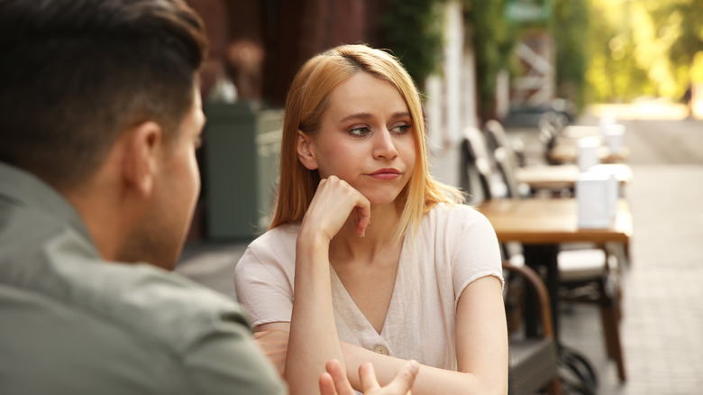 woman bored during date