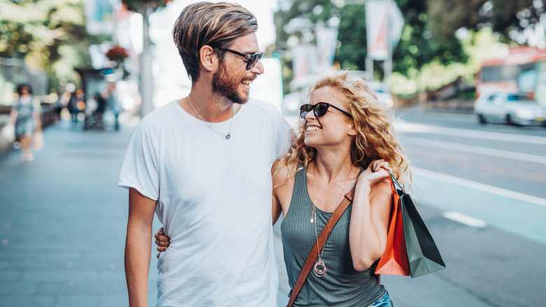 Couple Christmas shopping in summer