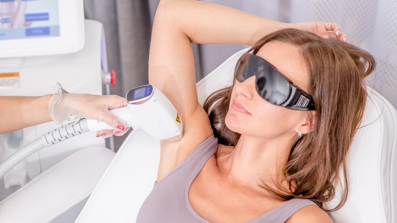 A woman getting laser hair removal