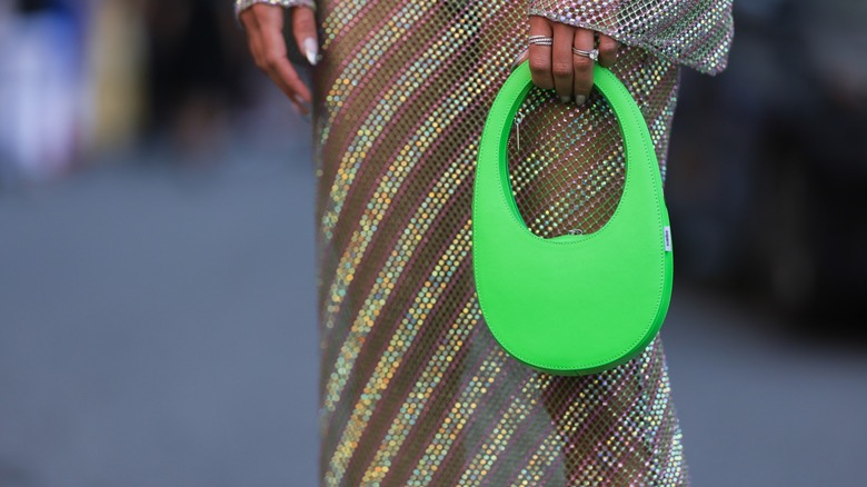 Neon green purse and sheer sparkly skirt