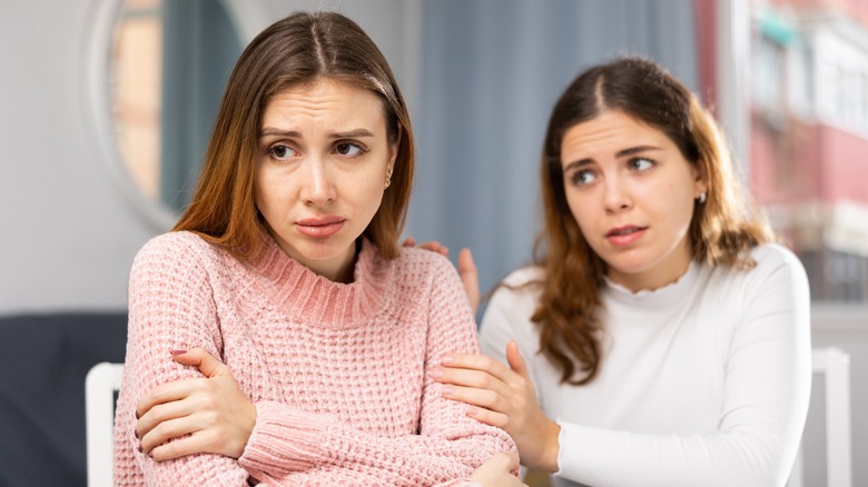 woman comforting distracted partner