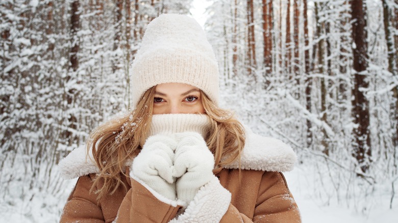 woman covered up in snow