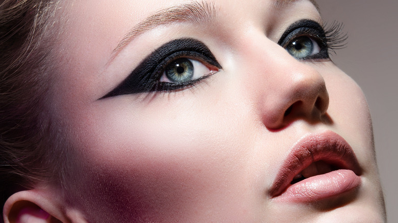 Model wearing graphic eyeliner