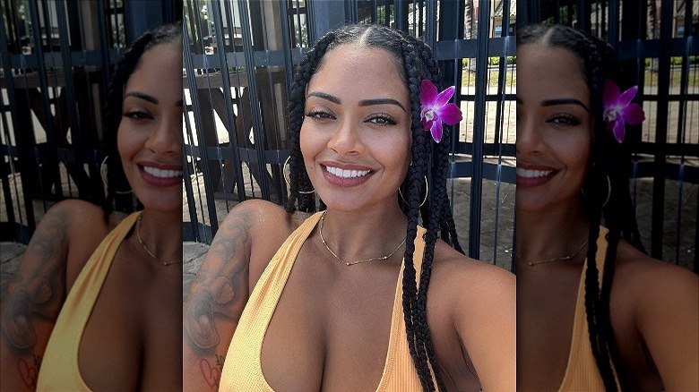 woman wearing witchy brunette braids