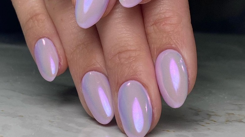 lavender chrome nails with blue tint