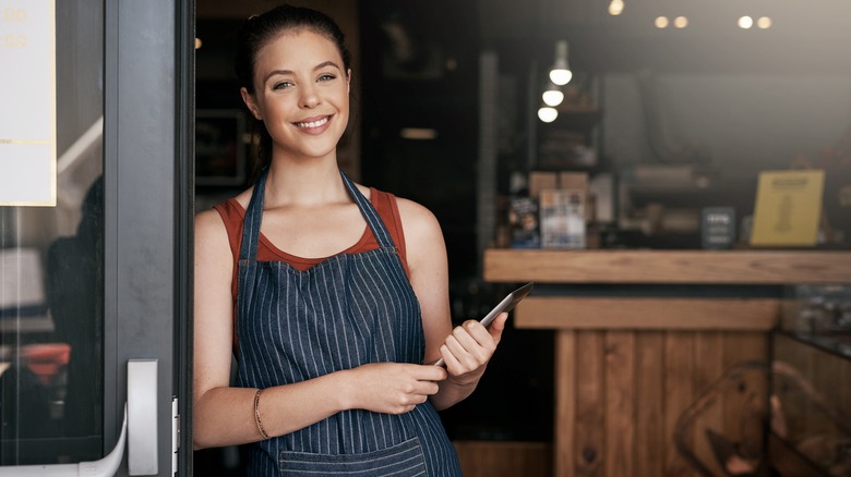 smiling woman in apron