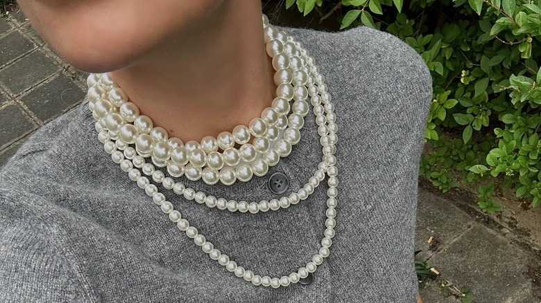 Girl wearing big pearls